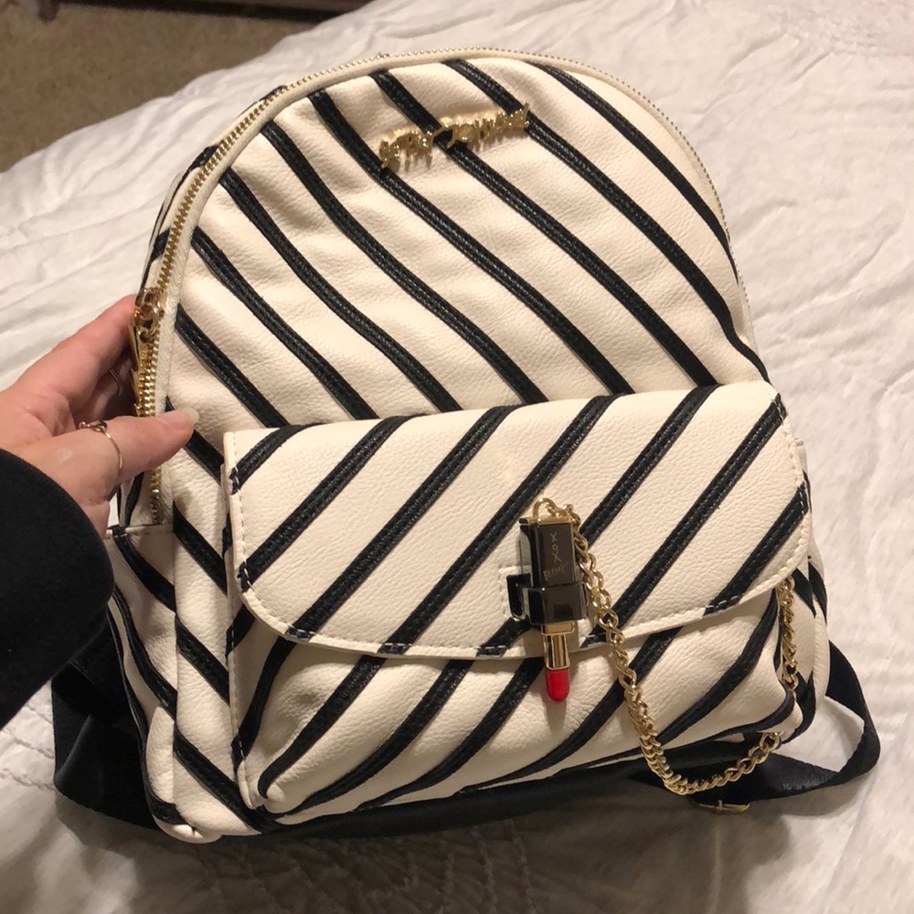 Mini Betsy Johnson backpack with lipstick